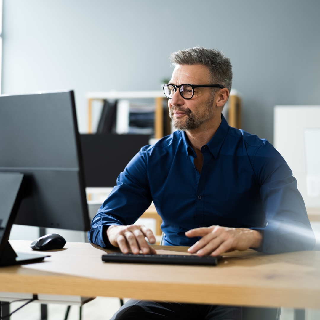 man working on computer