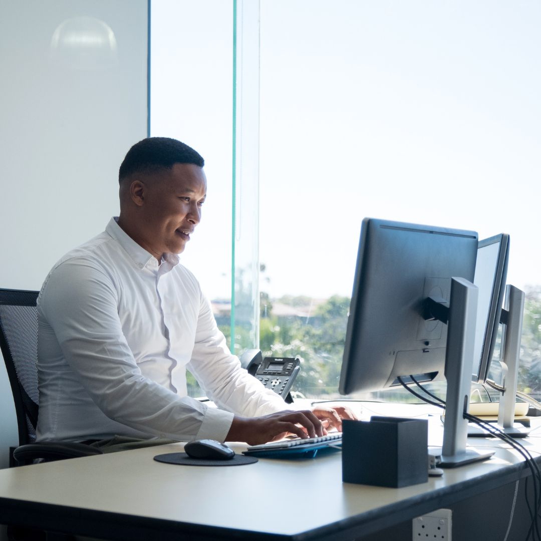 person using desktop computer