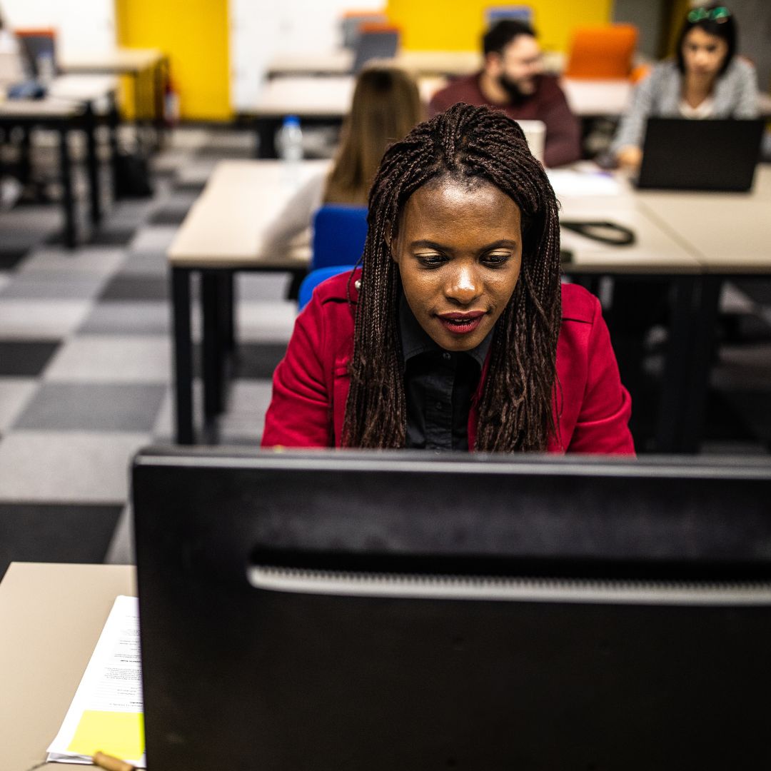 person using desktop computer