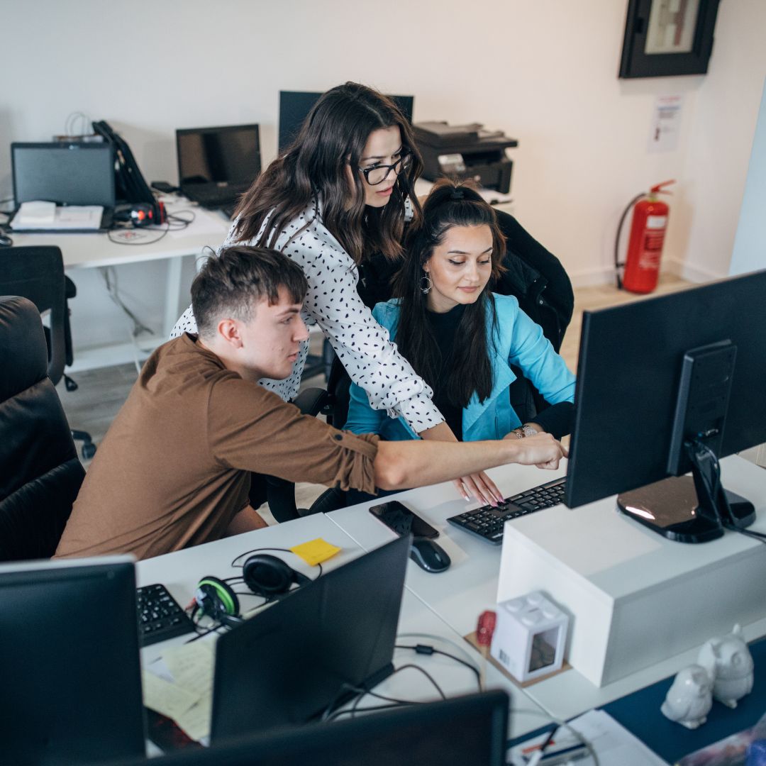 office team working on pcs