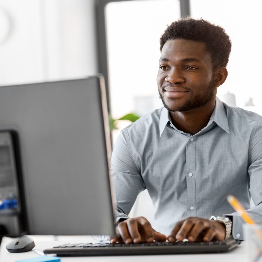 person working on pc computer